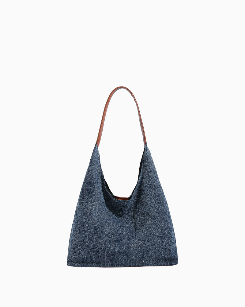 Urban stroll shoulder bag with structured fabric panels, clean stitching lines, neutral tones, compact shape, and a practical everyday silhouette